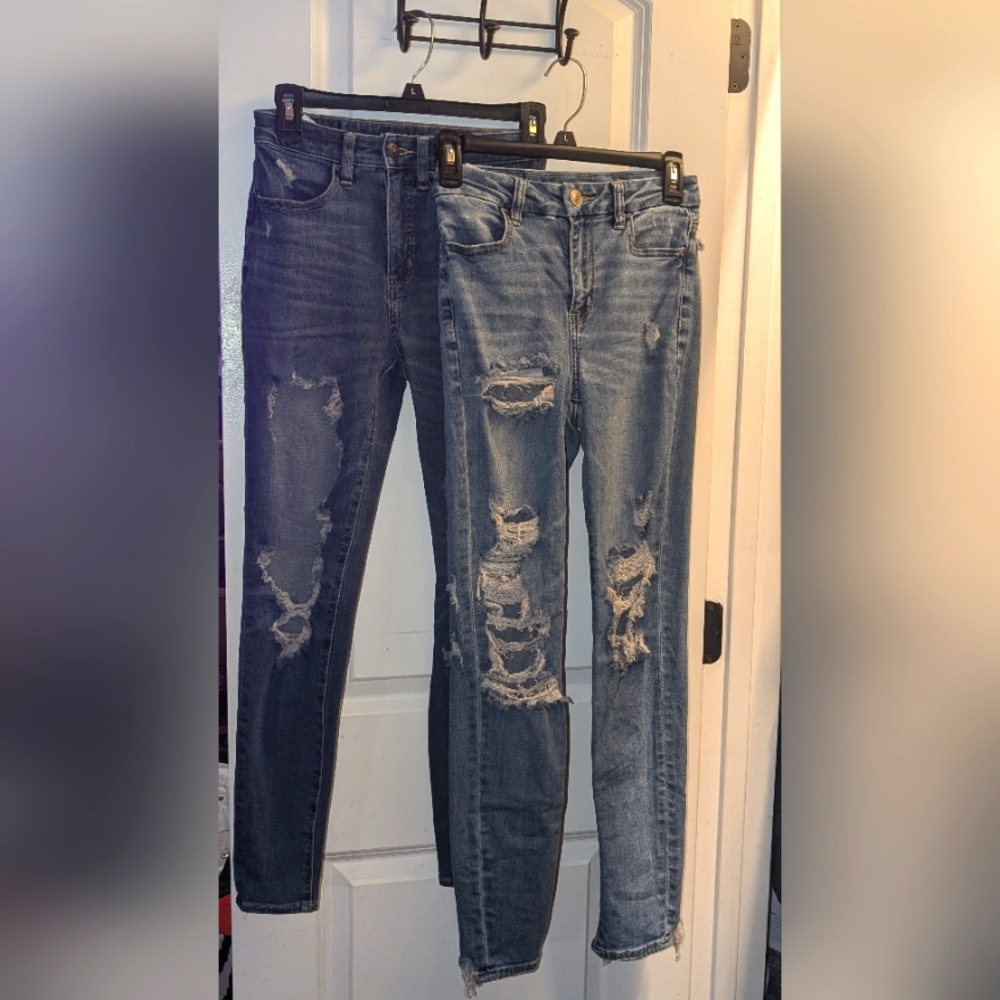 2 Pairs of Ripped AE Skinny Jeans - Size 0 & 2